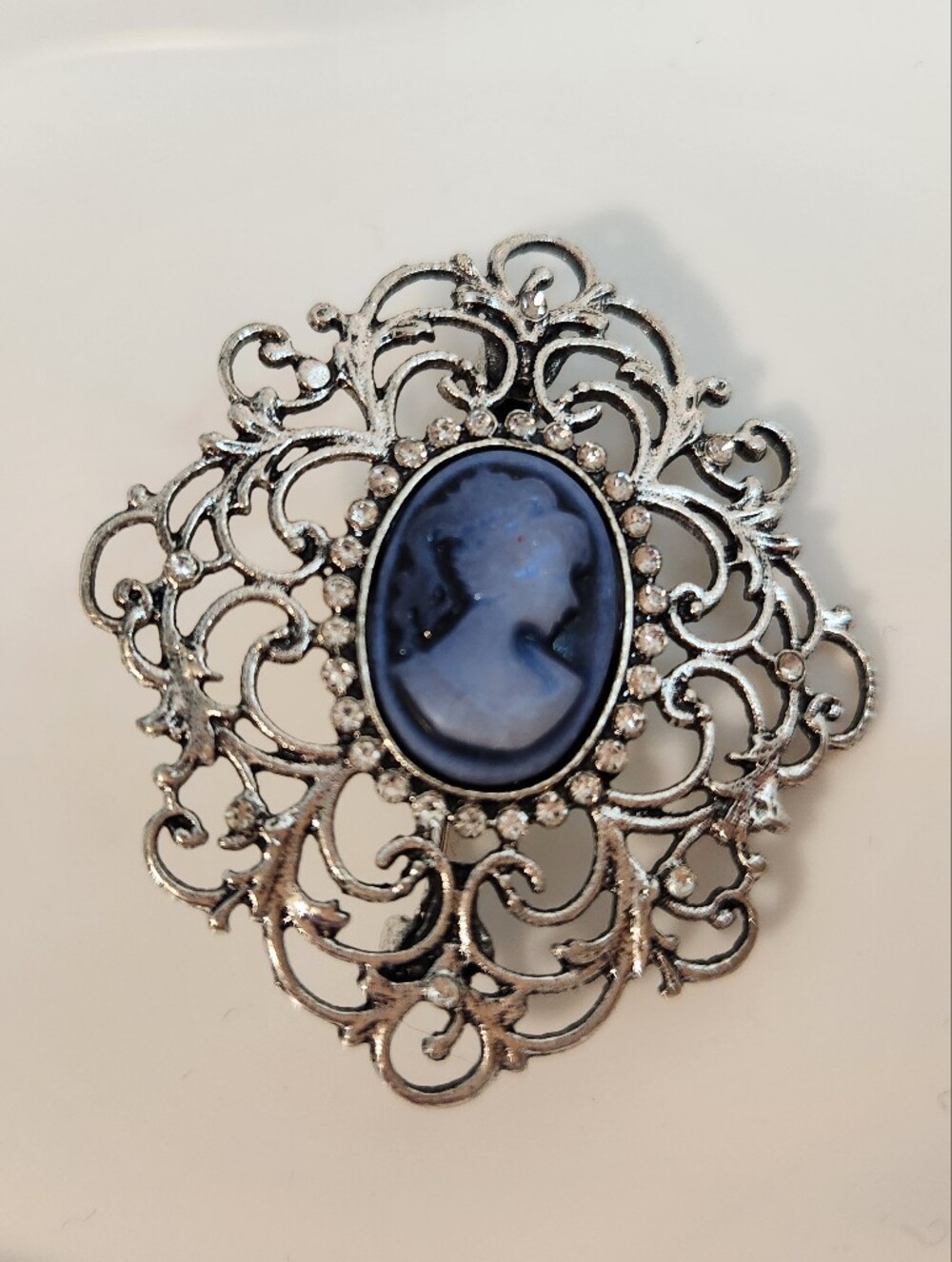 Silver Filigree Brooch with Blue Cameo Center
